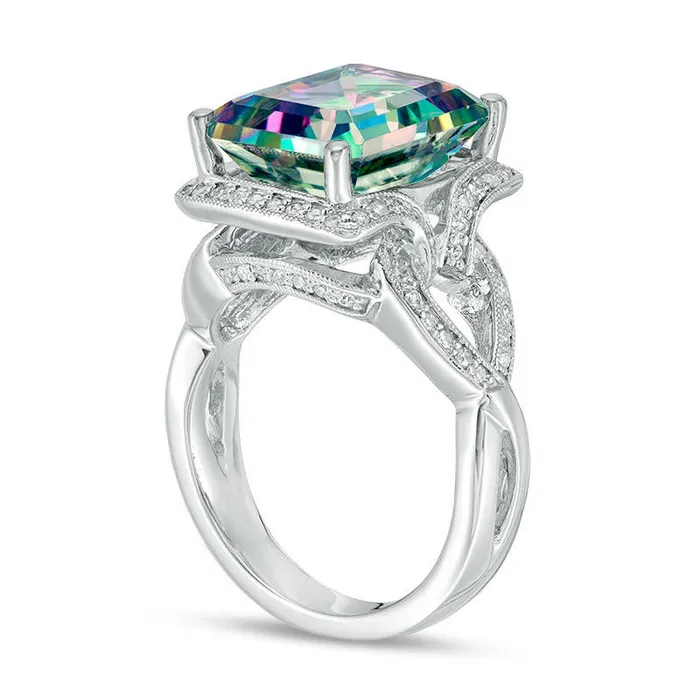 EmeraldCut Mystic Fire Topaz and 033 CT TW Natural Diamond Frame Antique VintageStyle Twist Ring in Solid 14K White Gold Goldia Rings EmeraldCut Mystic Fire Topaz and 033 CT TW Natural Diamond Frame Antique VintageStyle Twist Ring in Solid 14K White Gold Goldia Rings